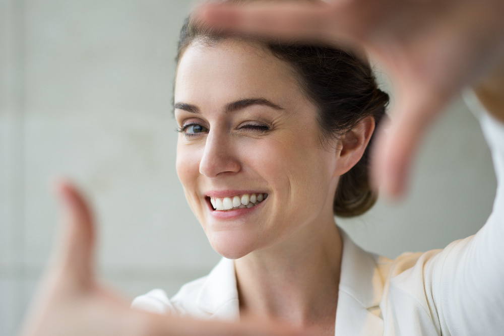 Girl smiling and showing her bright teeth